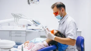 Dentist consulting with a patient about cosmetic dentistry treatment options in Vancouver
